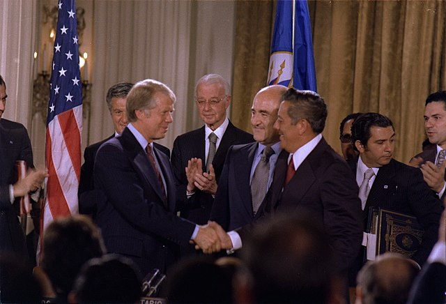 The Panama Canal Carter and Torrijos signing the Panama Canal Treaty on September 7, 1977 StudySmarter
