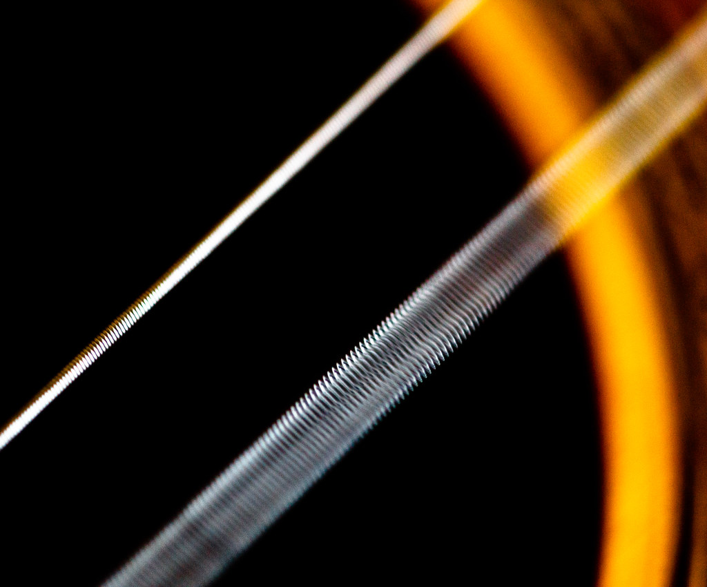 Oscilaciones Vibración de una cuerda de guitarra StudySmarter