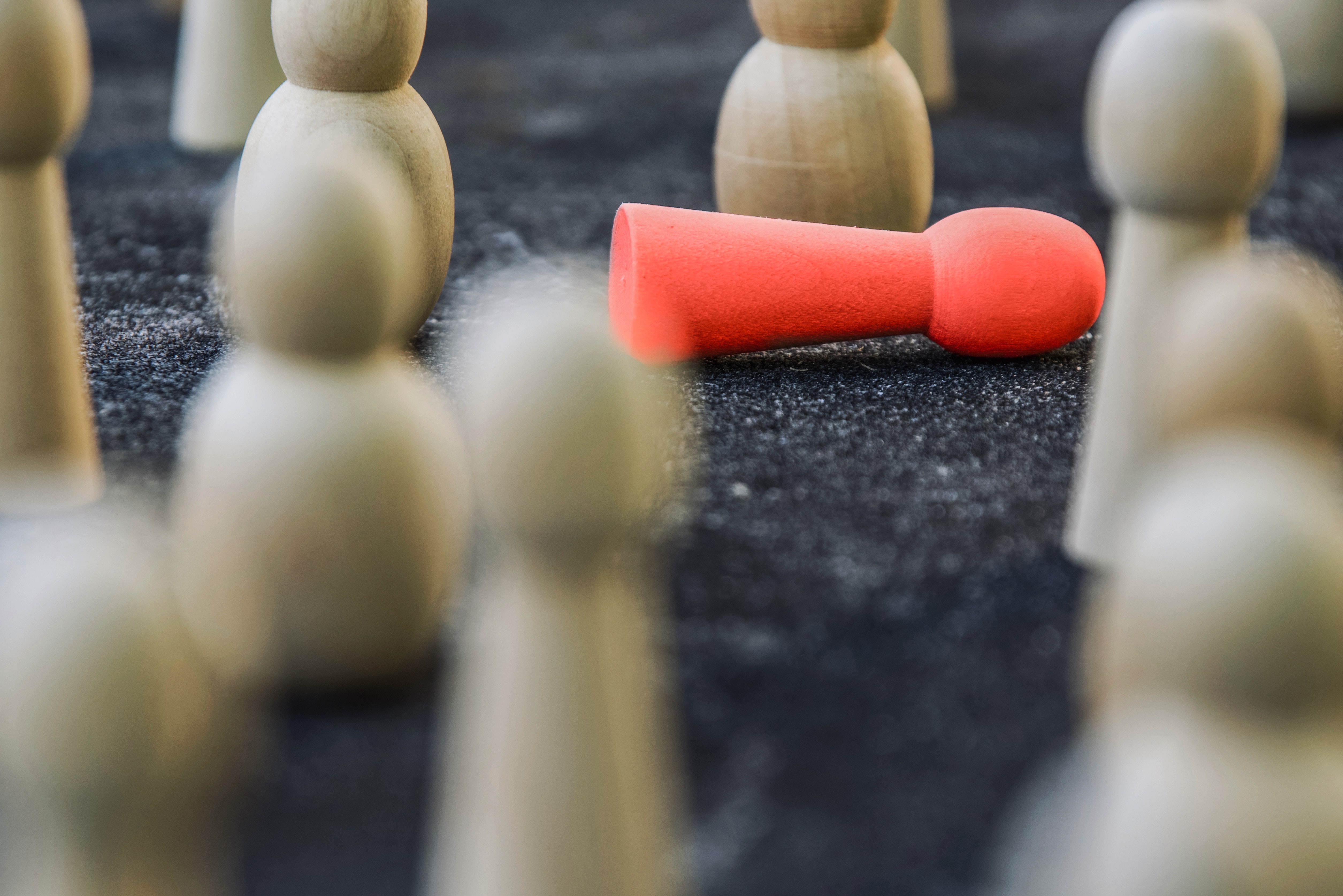 Native Son, One fallen red piece surrounded by standing white pieces, StudySmarter