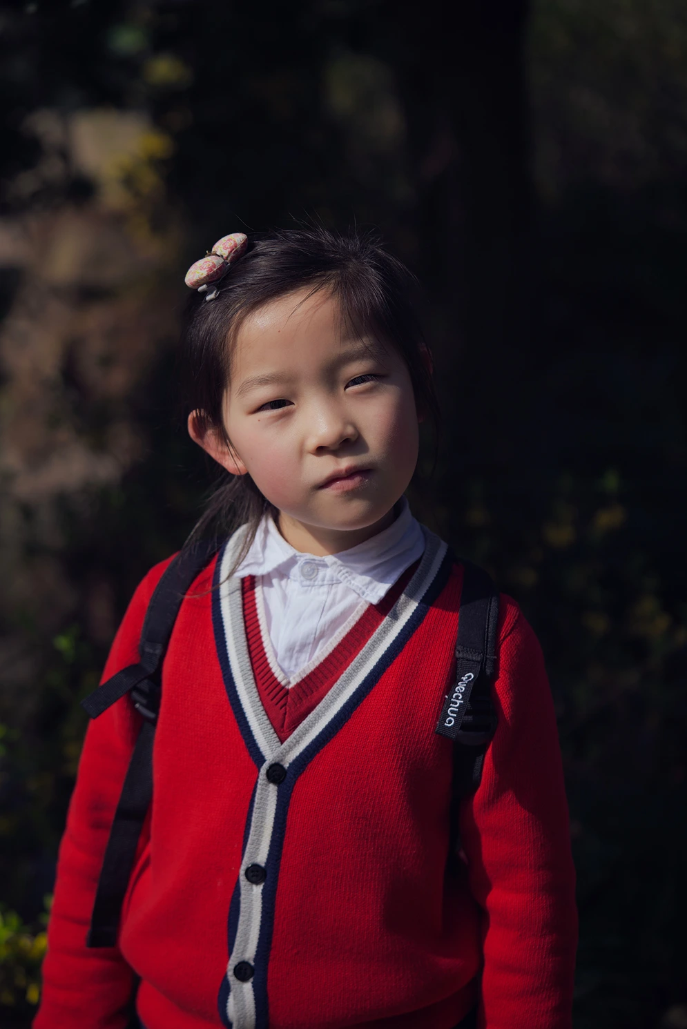 Feminist Theory of Education, Photo of Chinese schoolgirl, StudySmarter