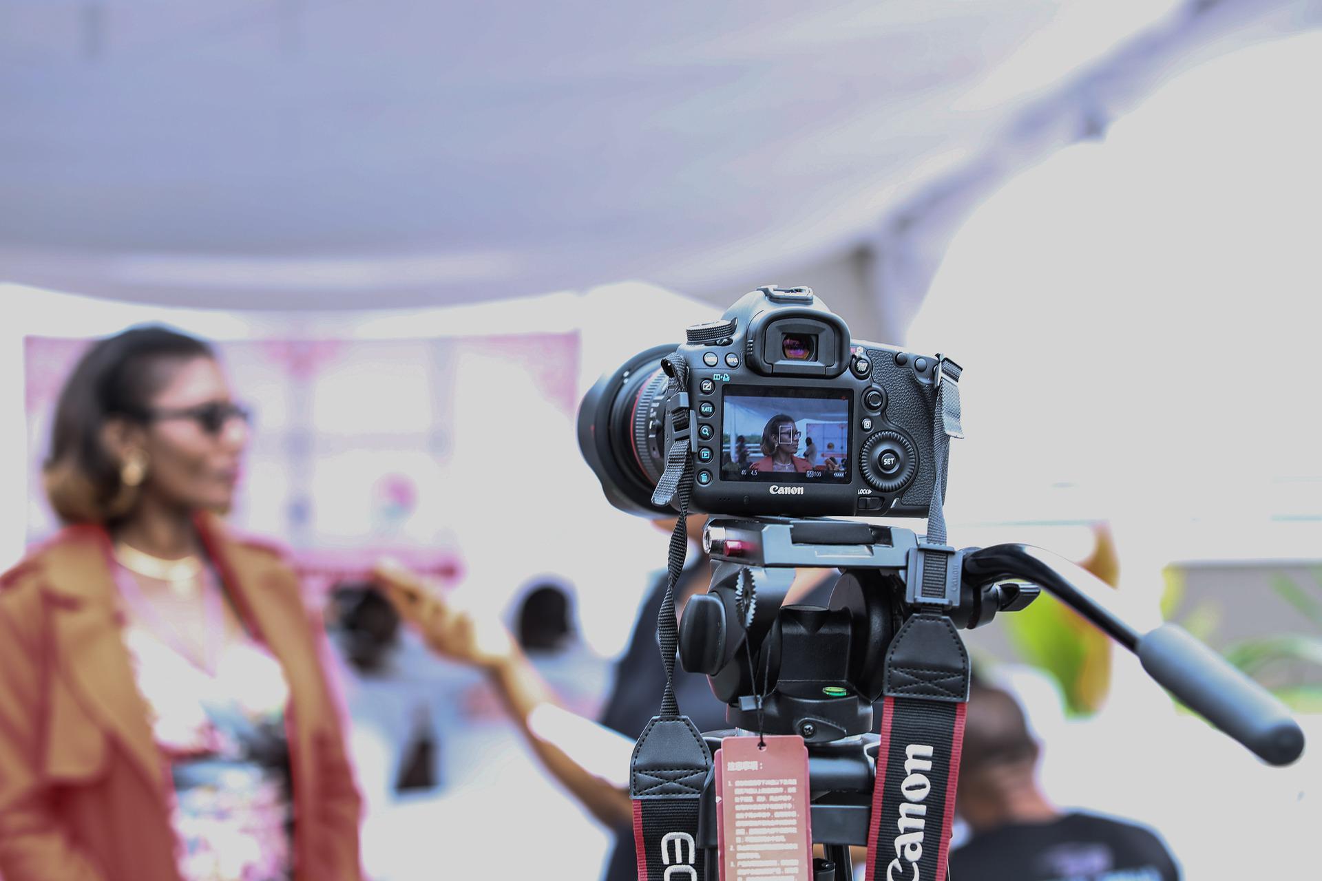 Media Representations and Audiences, Closeup image of film camera on set,  StudySmarter