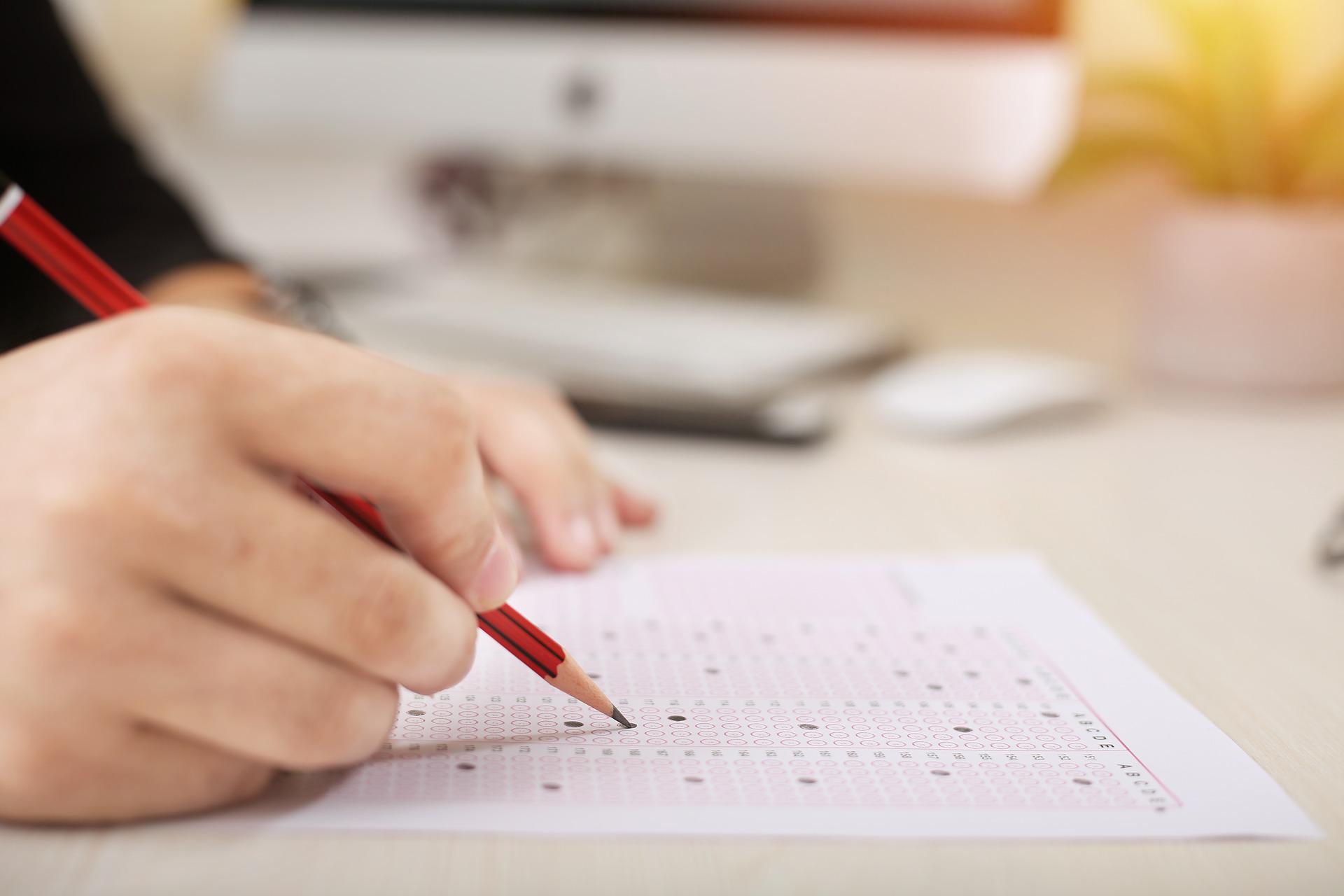 Lewis Terman | Fig 1 A photo of someone taking a test | StudySmarter
