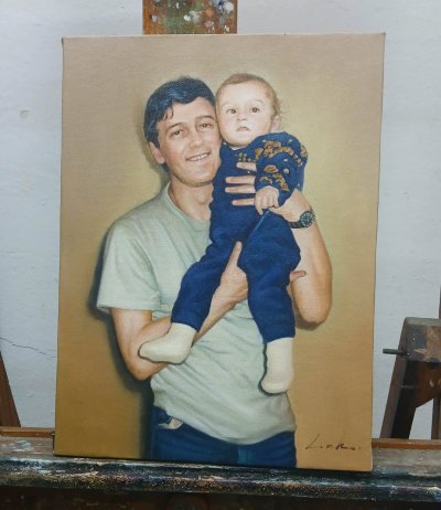 A custom oil painting of dad and baby