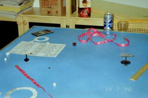 My failed attempt to create miniature gaming space in my previous apartment.

Don't fool yourself. Buy a house with a proper game room.