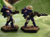 Trooper and cannon guy. I painted the inner barrel thingy in light blue without really thinking about it. Pink/red or green might have given better contrast.