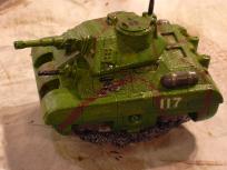 This was the first one of the tanks I painted, so it's in a rather dull all-green color scheme. There's a weak attempt at doing brownish camo streaks, but they don't show up well at all.
