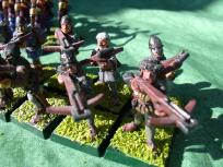 Citadel was experimenting with plastic bits for figures - these crossbows are plastic. As I understand it, the Founry re-issues have metal bows.