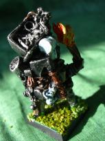 Sort of a joke about RPG characters who carry insane amounts of equipment, this guy has everything AND a kitchen sink! Should have painted it more colorfully, though.