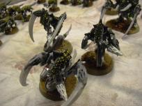 Raveners surge forward. These models are darn hard to balance. In the end I glued a 40mm washer under their bases too.