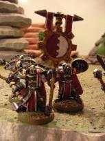 Why a troop of less than ten warriors need their own flag is beyond me, though...