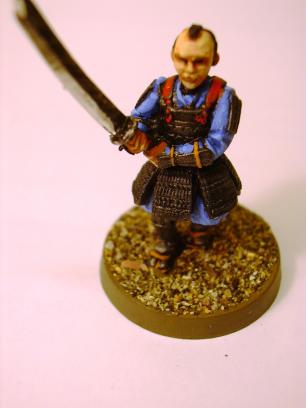 This quilted armor really should be colorful, I tried painting it but the individual strings were just too much, so I repainted it all black...