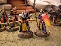 Spearman command, leader and standard bearer.