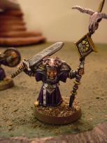 Standard bearer, the only guy with a face.