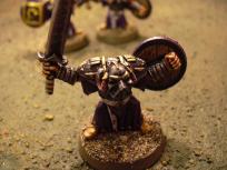 This one is almost identical, except the shoulder decoration and the fact that it originally came with the shield on the arm, not back. Also note the different, more plain, sword handle.