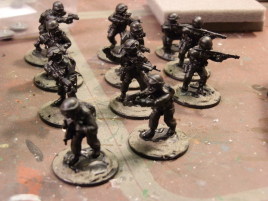 No, they are not done yet. Actually, I think I'll give them blue clothes just to not have all boring black.