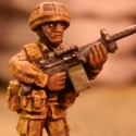 This time I lightened the camo a bit by drybrushing with the original color after washing it.