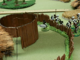 The cunning natives enter an abandoned village.