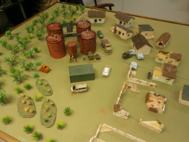 The storage tanks are attended by tecnician's unawre of Colenel Nyassa's troops nearby.