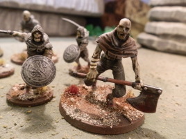 It's a large hollow from Dark Souls 3 with a more regular hollow soldier.