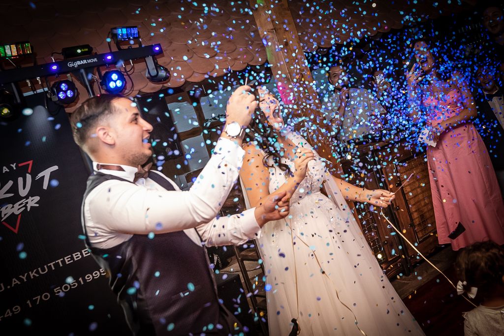 Bride and groom portrait in a green setting