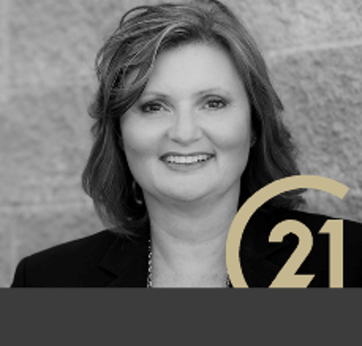Tina Cosman & Associates - CENTURY 21 Executives Realty Ltd