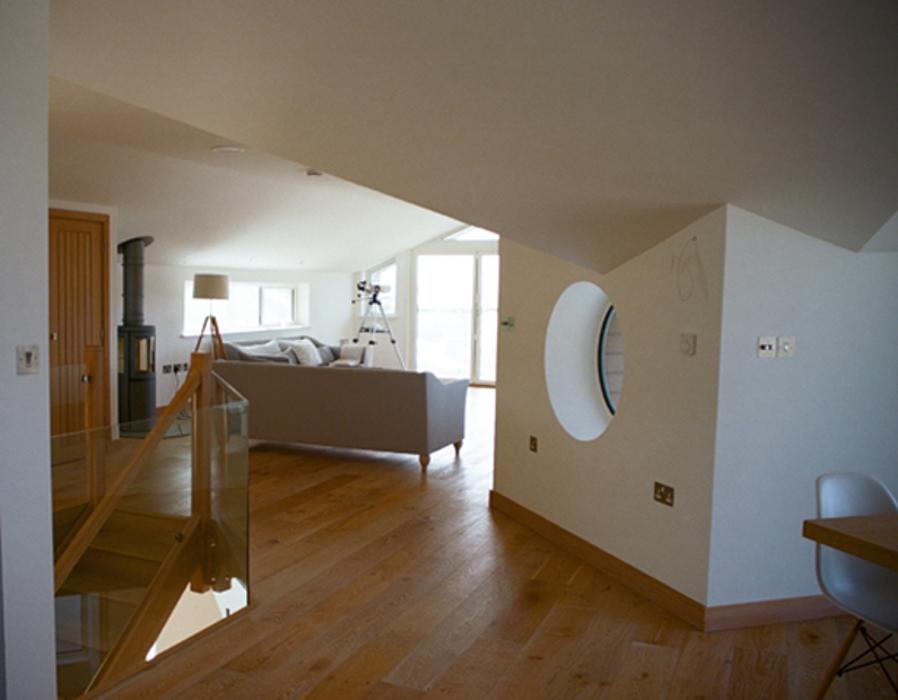 Flowing, open plan, sculptured interior.