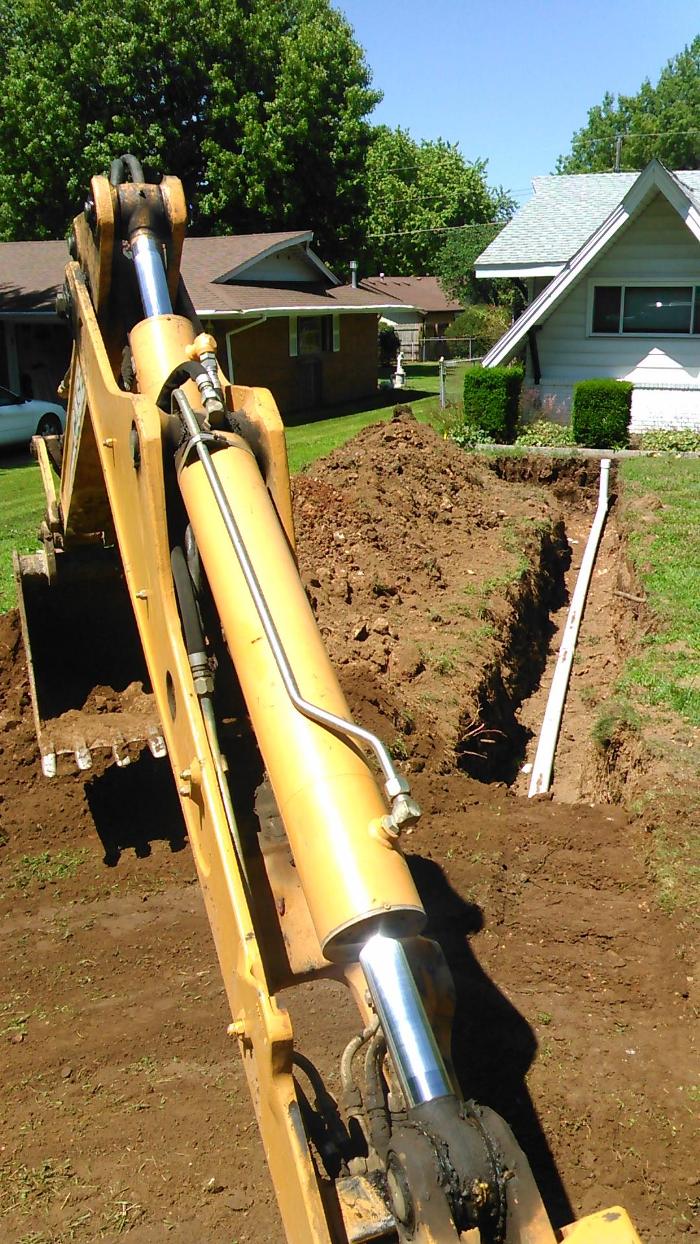 Kevins Backhoe Service Logo