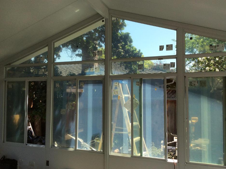 GDM Construction, Four Seasons Sunrooms, Progress photo, interior view, solid lower transoms, ConservaGlass operable windows, ConservaGlass trap windows, White material color