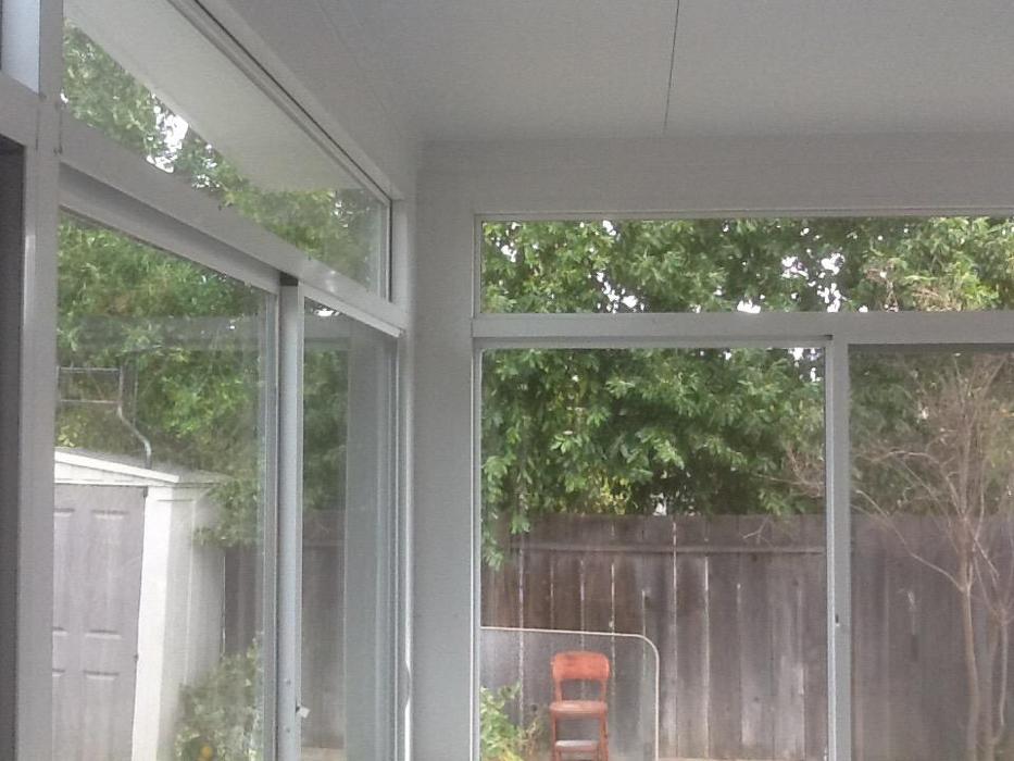 GDM Construction, Four Seasons Sunrooms, interior view, White materials, ConservaGlass upper transoms, ConservaGlass operable windows