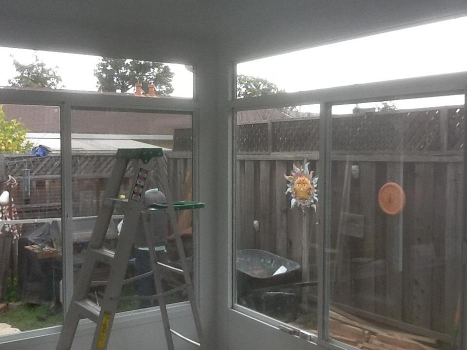 GDM Construction, Four Seasons Sunrooms, interior view, White materials, ConservaGlass upper transoms, ConservaGlass operable windows, solid lower transoms
