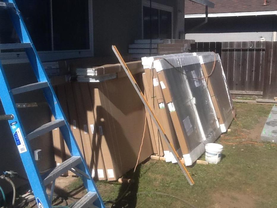 GDM Construction, Four Seasons Sunrooms, material delivery, ConservaGlass windows