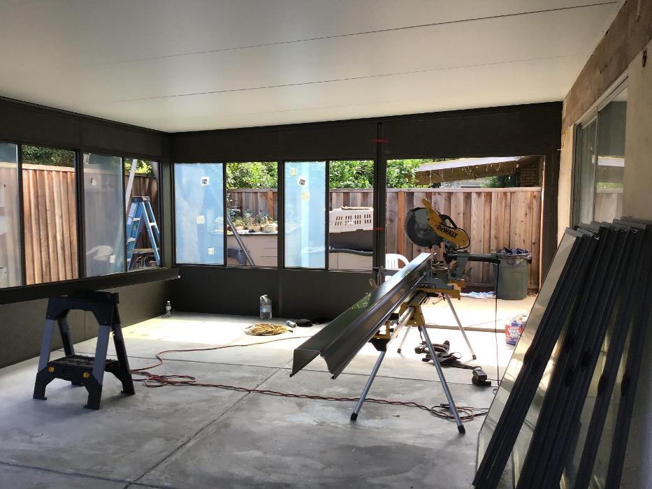 GDM Construction, Four Seasons Sunrooms, ConservaGlass operable windows, progress photo, Solid insulated roof system, solid insulated upper and lower transoms, flooring ready reinforced concrete foundation