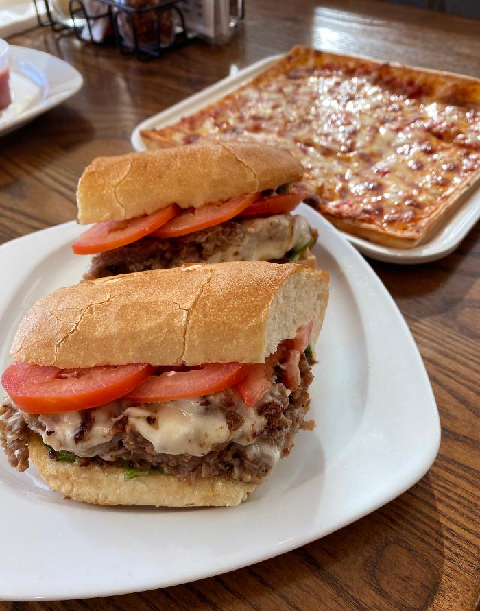 Steak and Cheese Sub and Cheese Pizza