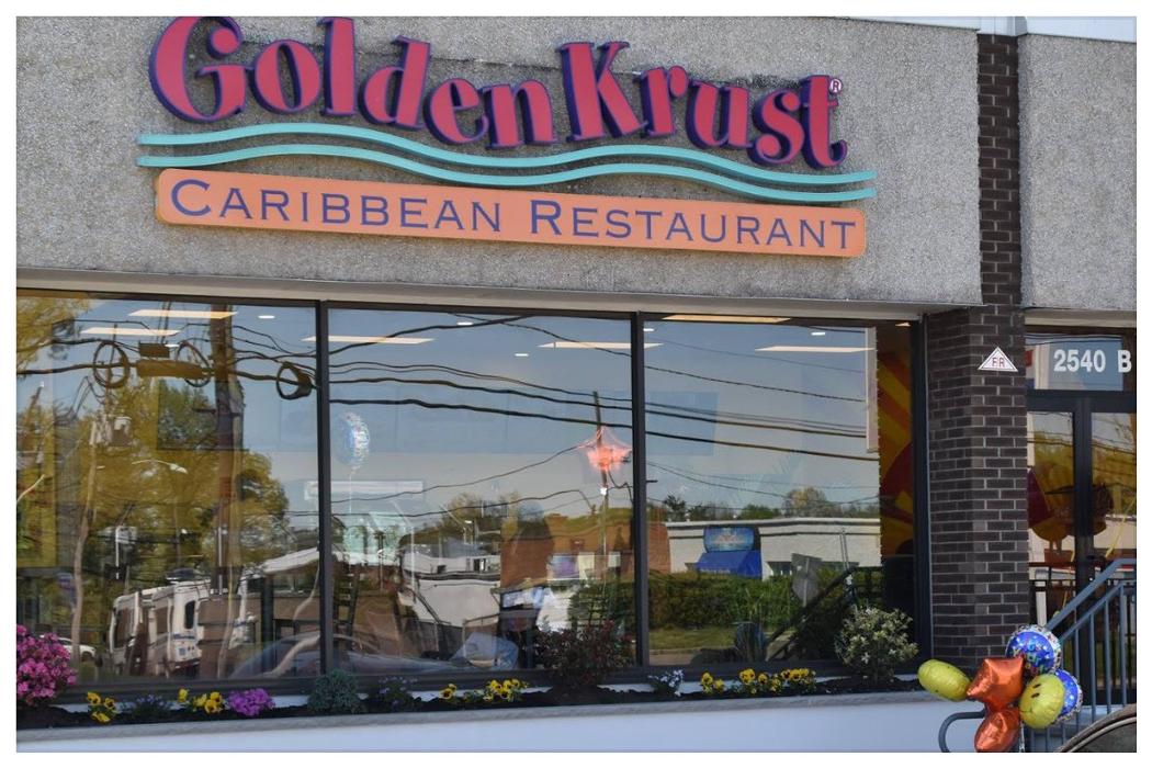 Golden Krust Caribbean Restaurant Logo