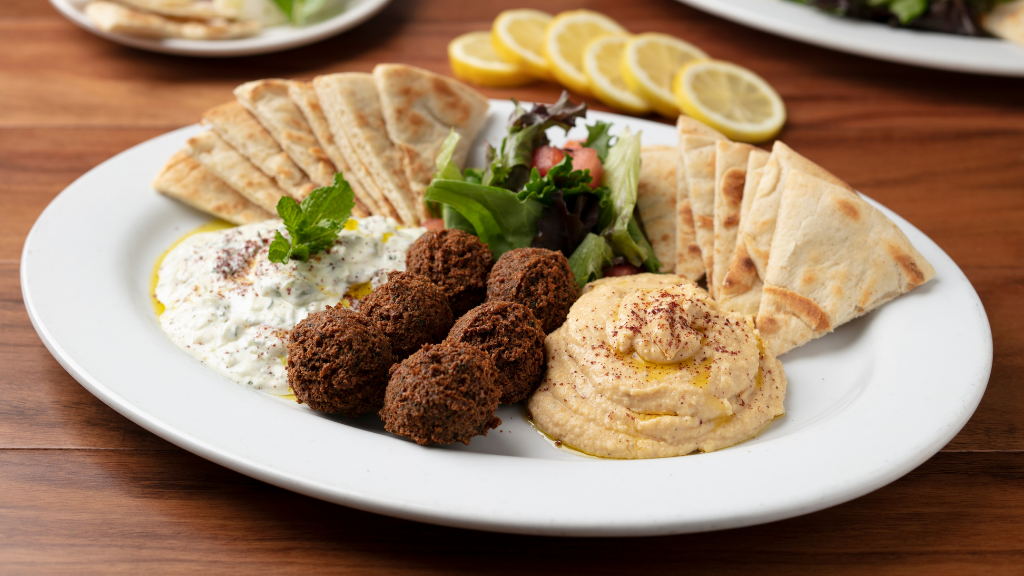 Falafel Combo Appetizer: Falafels are vegan & made in-house from fresh garbanzo beans & herbs