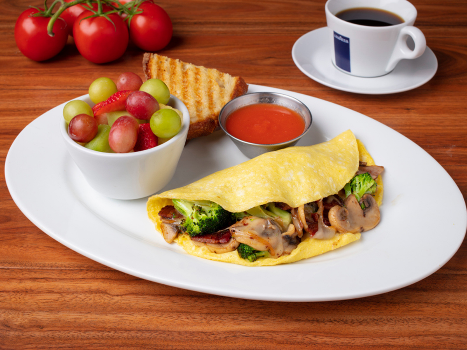 Create Your Own Omelette (Made with Brown Free Range Organic Eggs). Served with Artisan Toast and 1 Side.