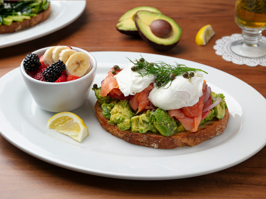 Open Face Smoked Salmon (Avocado Toast & Smoked Salmon. Topped w/ Two Organic Poached Eggs).