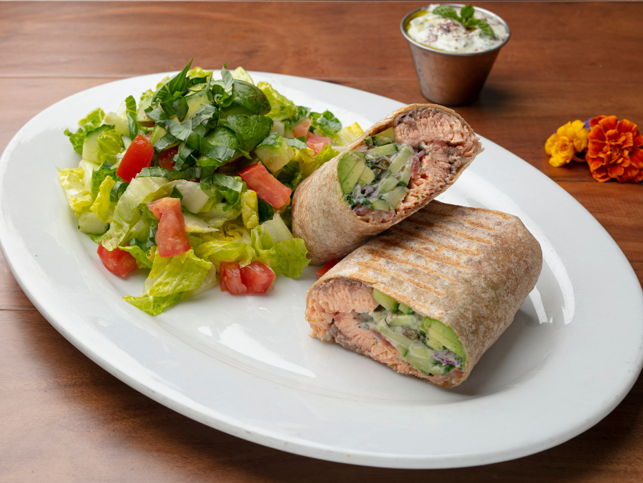 Salmon Wrap: Grilled Atlantic Salmon, Tzatziki, Lettuce, Tomato, Cucumber, Dill, Capers, Red Onion, Fresh Avocado in a Tortilla