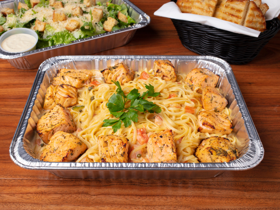 Family Pasta Combo (Salmon Scampi Linguine): Feeds 4-6 and includes 1 pasta, 1 salad, and grilled artisan bread