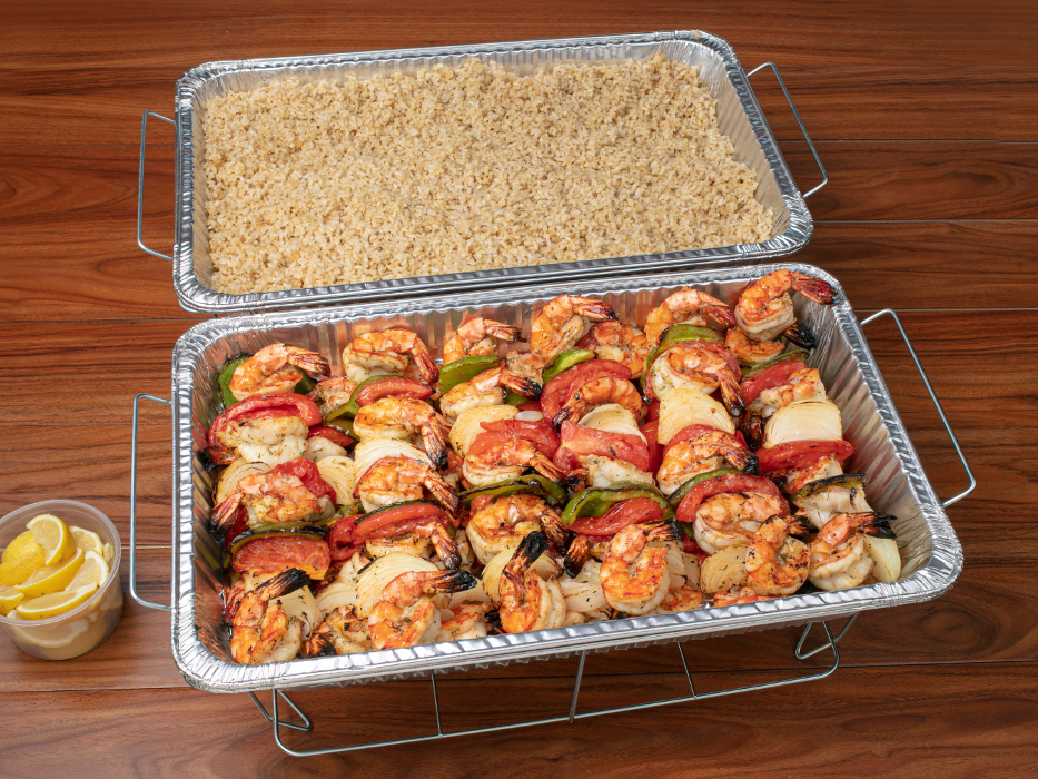 Jumbo Shrimp Kabob Tray: 12 skewers of jumbo shrimp kabobs and grilled vegetables along with a choice of rice