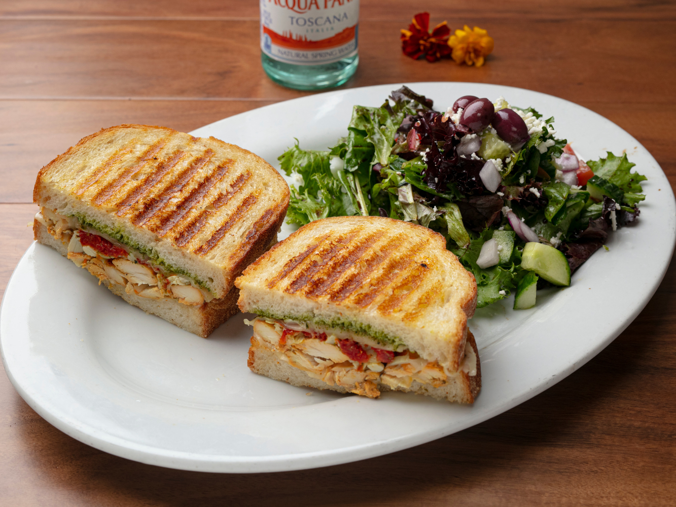 Chicken Pesto Panini (Wayne Farms Grilled Antibiotic Free Chicken, Artichoke Hearts, Fontina Cheese & Homemade Pesto)