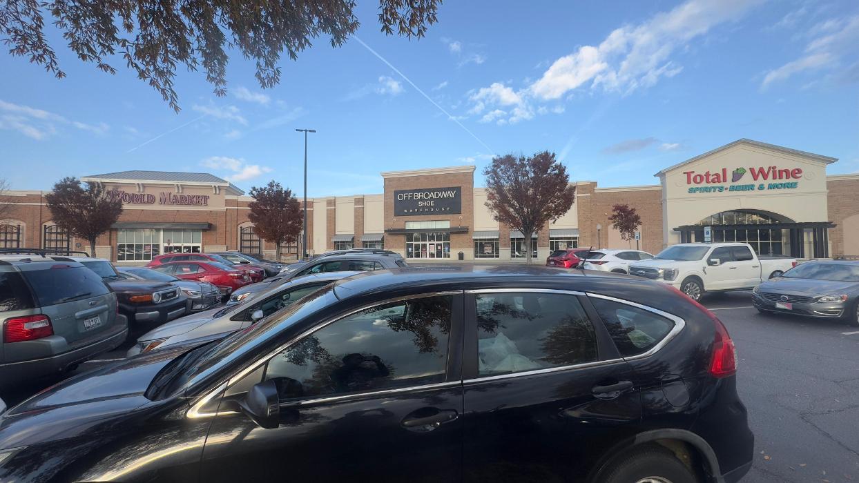 Off Broadway Shoe Warehouse Logo