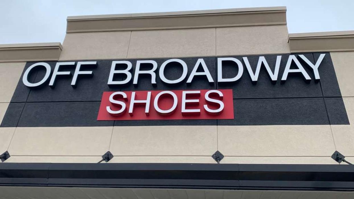 Off Broadway Shoe Warehouse Logo