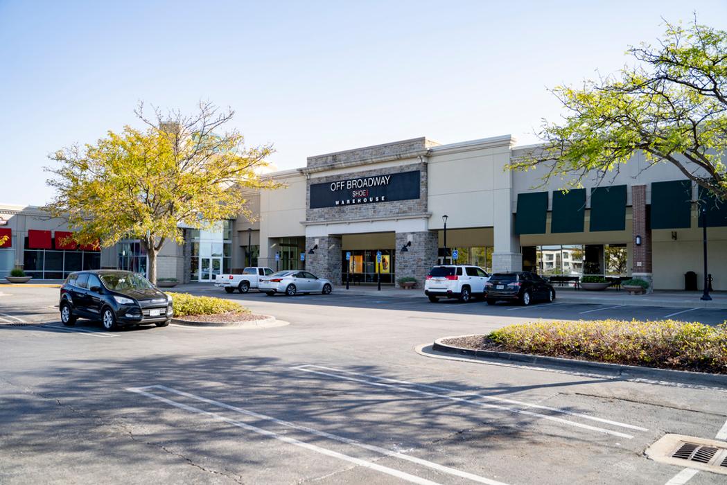 Off Broadway Shoe Warehouse Logo