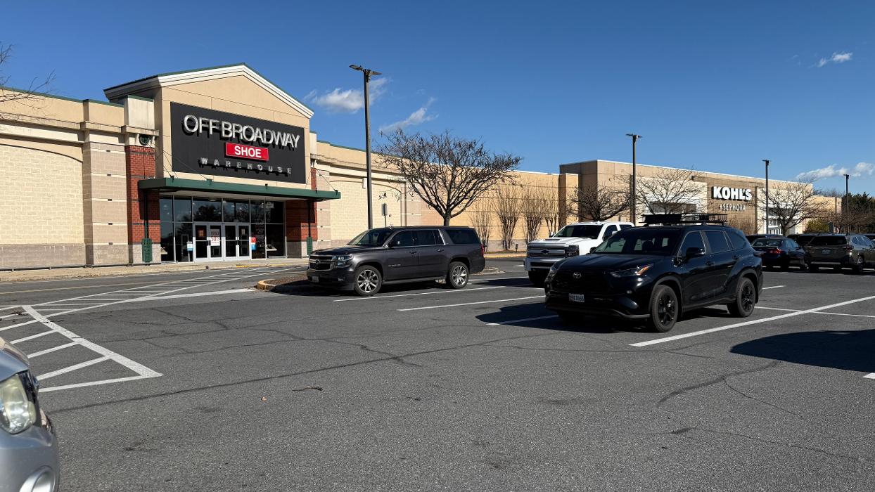 Off Broadway Shoe Warehouse Logo