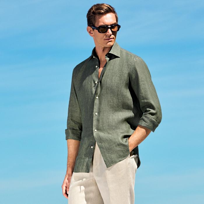 This green shirt is tailored to an overshirt fit and features a classic widespread collar, single cuff, and French placket.