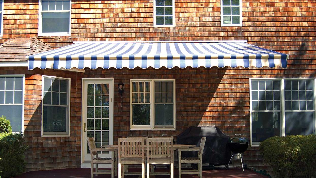 Golden Needle Awning Logo