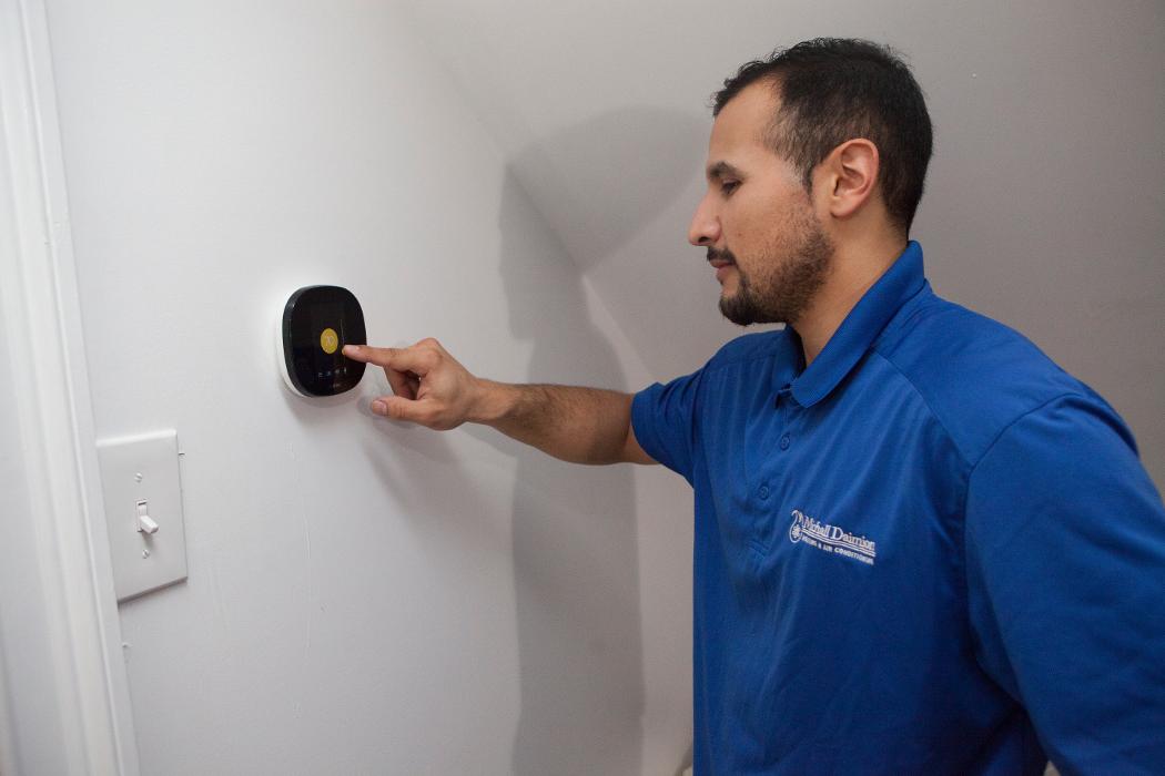 Michall Daimion Heating &amp; Air Conditioning, Inc. Logo