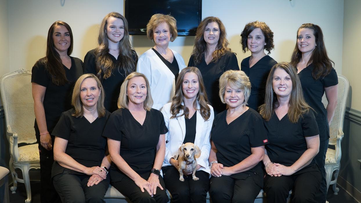 Smiles By Design Logo