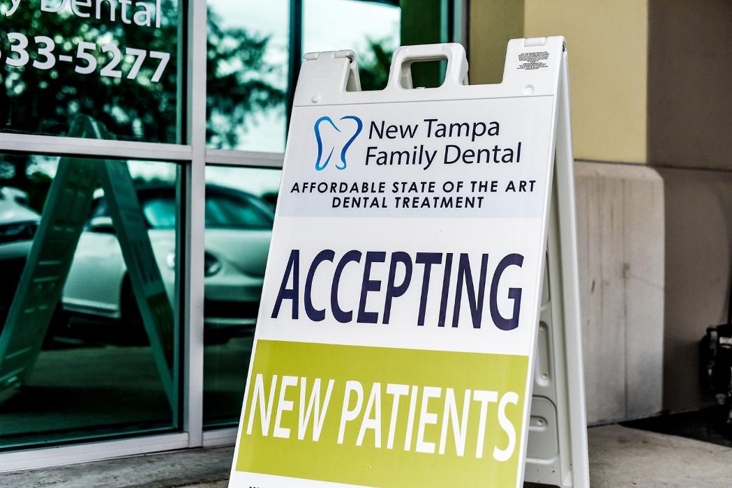 New Tampa Family &amp; Emergency Dental Logo